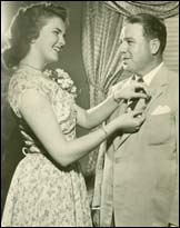 BeBe Shopp, Miss America 1948, makes Mayor Cooper Green of Birmingham, Alabama an honorary citizen of Minnesota just after he was elected President of the National Association of Mayors.